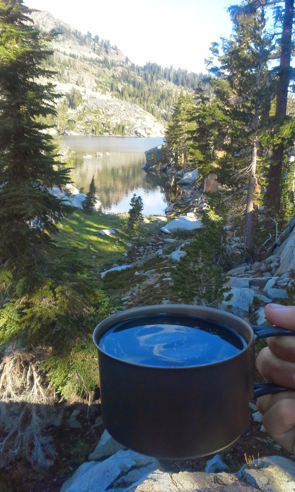 Morning coffee in a titanium cup at camp in Desolation Wilderness