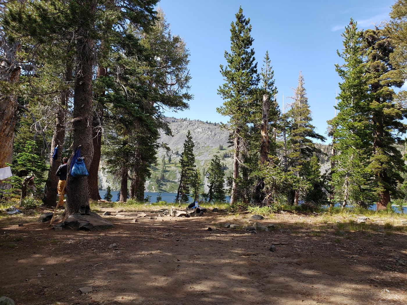A backcountry campsite on granite above Lake Gilmore in Desolation Wilderness