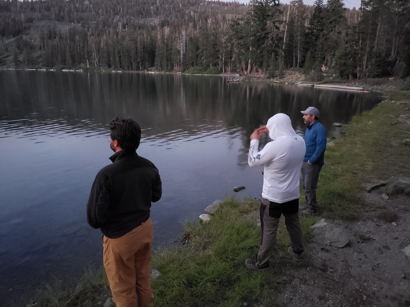Evening light over Lake Gilmore from camp, still water and dimming sky