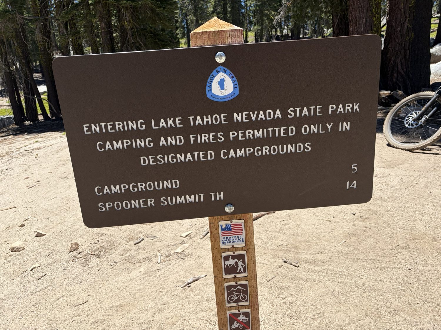 A brown wooden sign marking entry to Lake Tahoe Nevada State Park near Spooner Summit