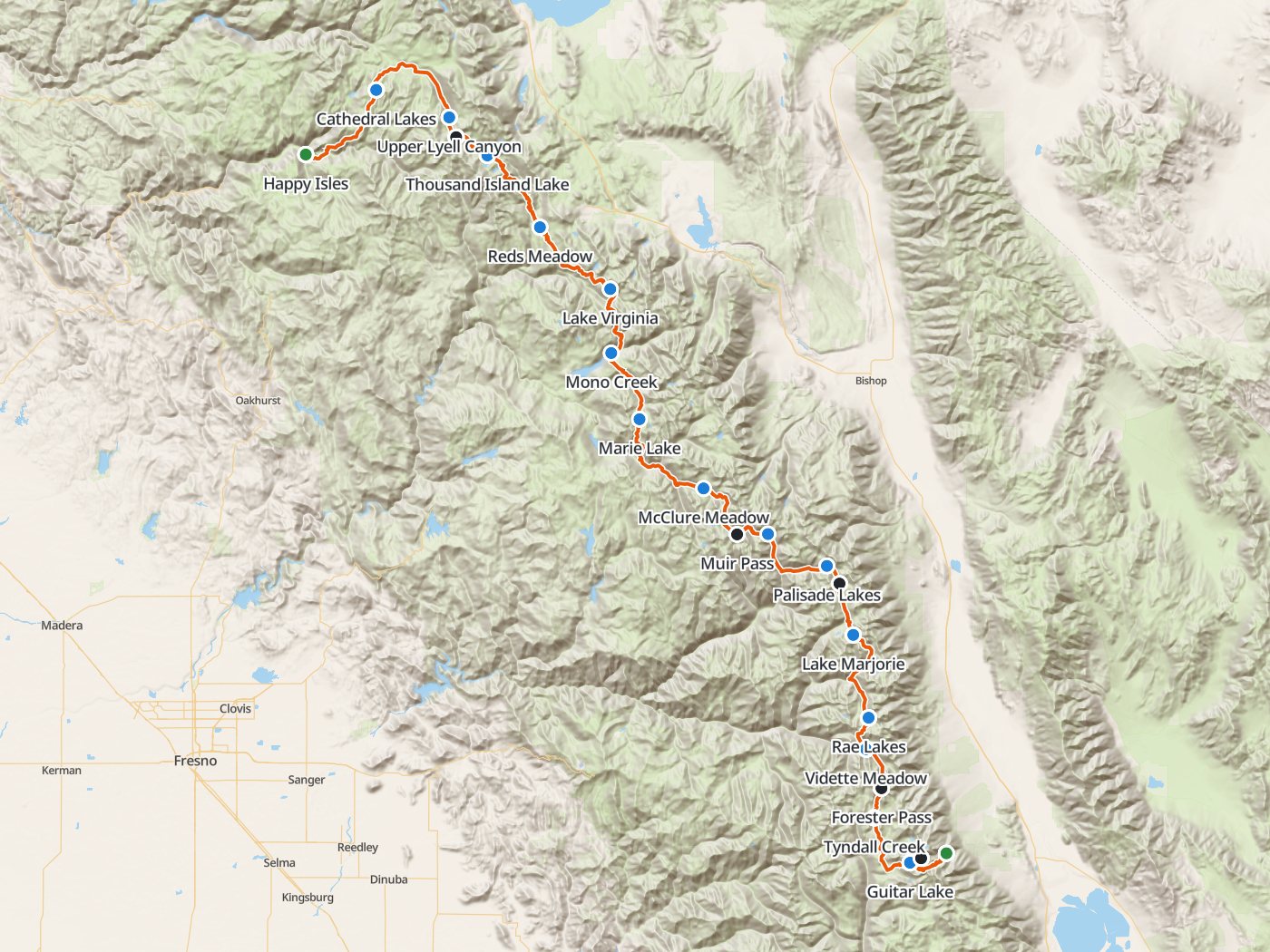 Topographic map of the John Muir Trail, with the route drawn in orange from Happy Isles in Yosemite Valley northeast to Cathedral Lakes and Tuolumne Meadows, then south along the Sierra crest past Thousand Island Lake, Reds Meadow, Marie Lake, Muir Pass, the Palisade Lakes, and the Rae Lakes to Mount Whitney