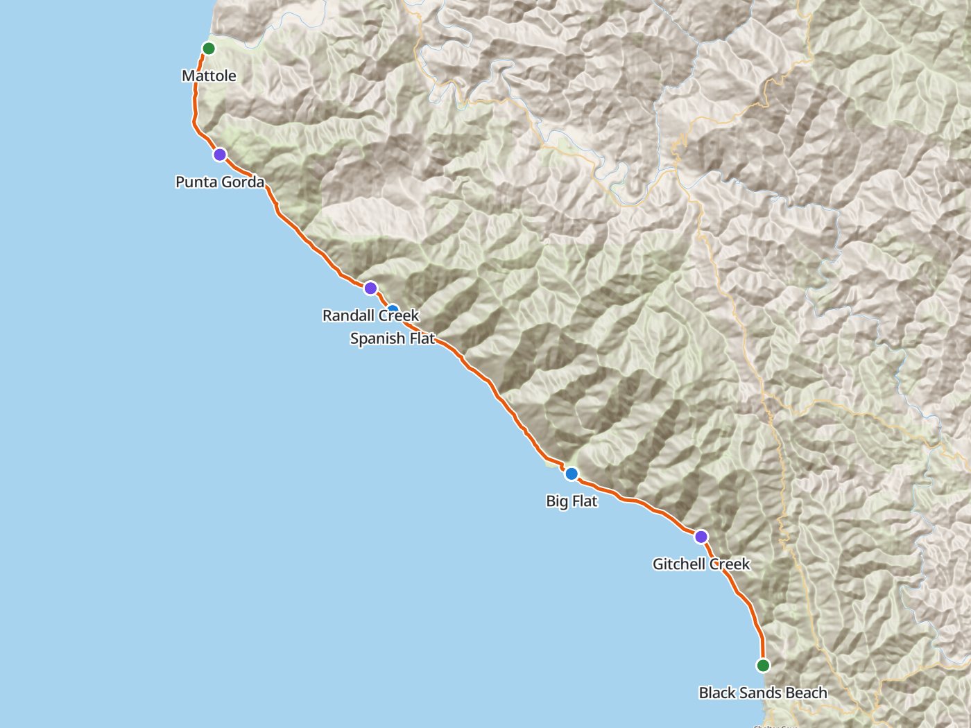 Topographic map of the Lost Coast Trail, with the route drawn in orange along the shoreline from Mattole south past Punta Gorda, Randall Creek, Spanish Flat, Big Flat, and Gitchell Creek to Black Sands Beach