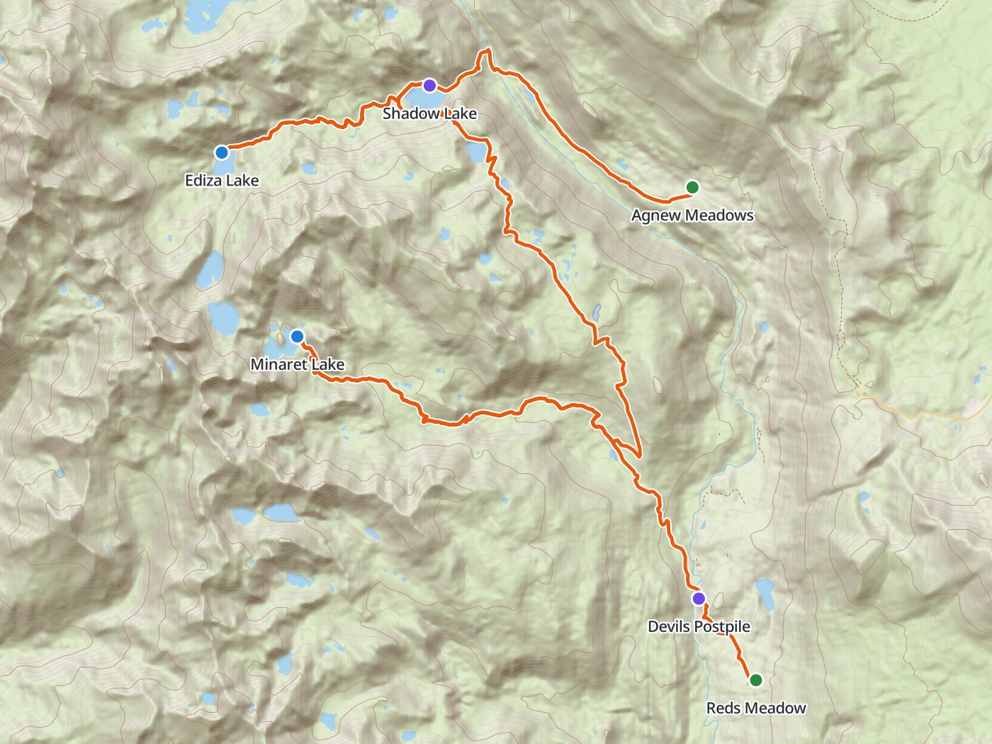 Topographic map of the Minarets loop, with the route drawn in orange from Agnew Meadows west to Shadow Lake and Ediza Lake, back to the John Muir Trail, south to Johnston Meadow, up Minaret Creek to Minaret Lake, and down past Devils Postpile to Reds Meadow